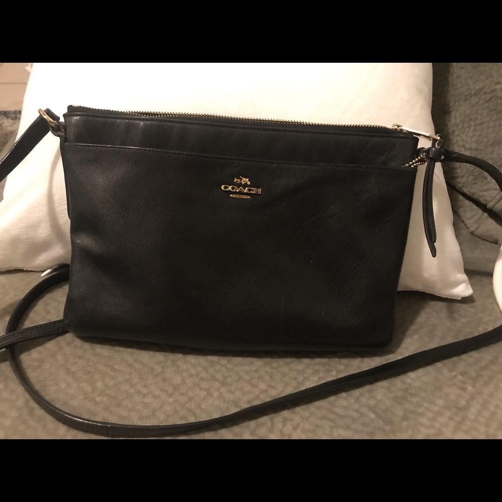Coach black leather crossbody bag.